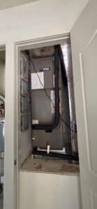 Professional AC installation in Mango Florida near residential home with tropical landscaping